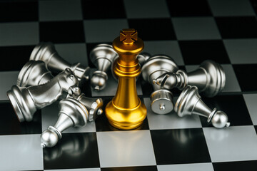 Team leader. gold and silver chess pieces on chess board game competition on dark background,...