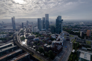 Fototapeta na wymiar Manchester City Centre Drone Aerial View Above Building Work Skyline Construction Blue Sky Summer Beetham Tower Apartments Estate Agent