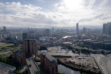 Obraz premium Manchester City Centre Drone Aerial View Above Building Work Skyline Construction Blue Sky Summer Beetham Tower Apartments Estate Agent 2022