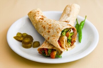 Lavash doner kebab ( zurna doner durum )  or shawarma sliced in plate isolated. 