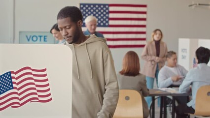 Slowmo of multiethnic men and women standing in queue at local electoral district, signing papers and ballots and voting