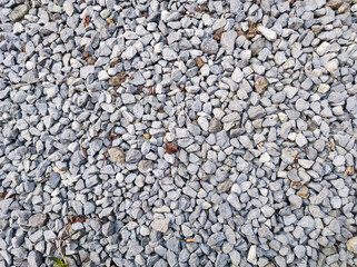 Gravel path texture. ROad made wit crushed stone. Pebble texture. Outdoor background