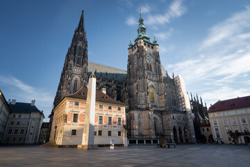 Fototapeta premium St. Vitus Cathedral at Prague Castle in Prague under moving clouds. Long exposure, Summer. No people.