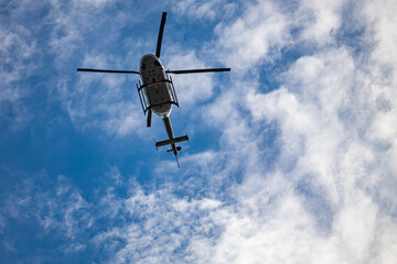 Fototapeta na wymiar Moscow, Russia - July 21, 2022: transport helicopter against the blue sky