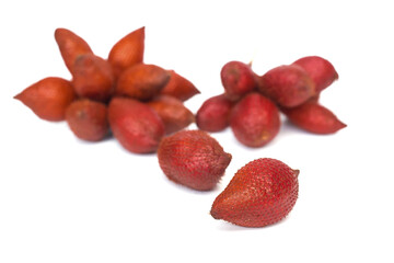 Salak or Zalacca is a species of palm tree native to Indonesia. It has a red rind and qa sour taste.
