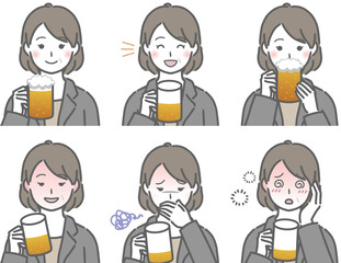 お酒を飲むスーツの中年女性