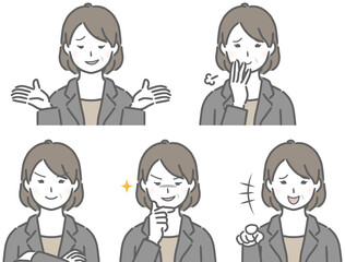 嫌な表情のスーツの中年女性