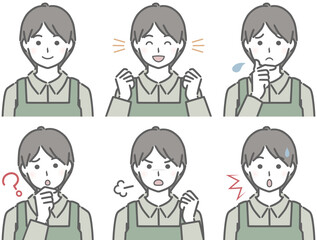 エプロンの若い男性の色々な表情