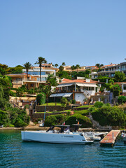 Fototapeta na wymiar Architecture of houses on the coast of the port of Mahon (Mao) in Menorca, Spain