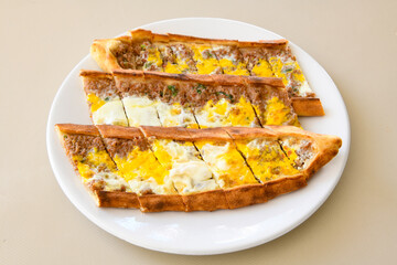 Kiymali pide. Turkish pide with minced meat. Turkish pizza mince pita Pide on white background. Etli ekmek. Kusbasi kasarli pide.