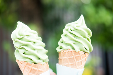 Two soft serve ice cream cone with premium matcha green tea