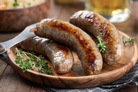 Fried bratwurst garnishrd with thyme