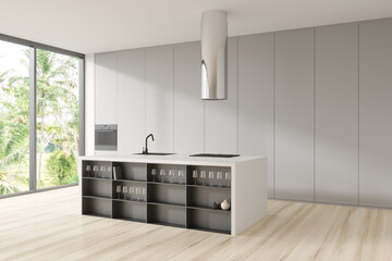 Corner view on bright studio room interior with bar counter