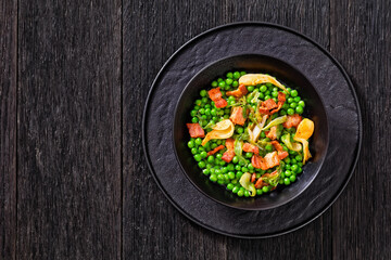 petits pois, french dish of garden green peas
