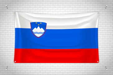 Slovenia flag hanging on brick wall. 3D drawing. Flag attached to the wall. Neatly drawing in groups on separate layers for easy editing.