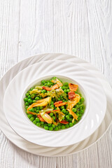petits pois, french dish of garden green peas