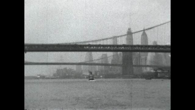East River Bridges 1931 - Viewing the Brooklyn, Manhattan and Williamsburg Bridges from a ferry traveling on the East River in New York City, 1931.