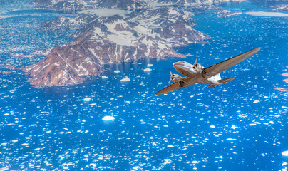 Propeller airliner flying over glaciers - Melting icebergs by the coast of Greenland, on a beautiful summer day - Melting of a iceberg and pouring water into the sea - Greenland