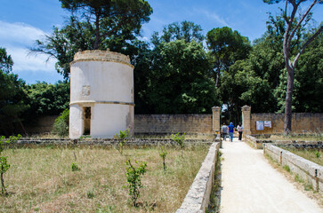 Fototapeta na wymiar La torre colombaia nel giardino del Palazzo Baronale Serafini Sauli a Tiggiano, borgo del Salento in Puglia