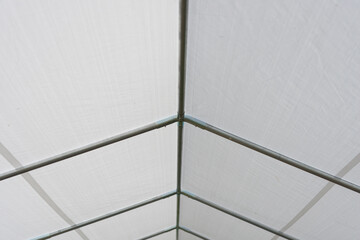 interior of an event or party tent feat. metal tubing structure