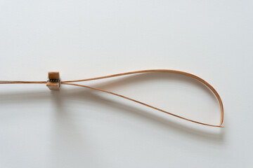 cracked vintage cedar wood strap and clothespin