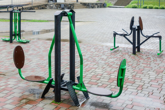 Close-up of an outdoor gym on a sports field in a park. Exercise stations in the public park. Free outdoor gym
