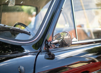 The old-timer car  in sunlight