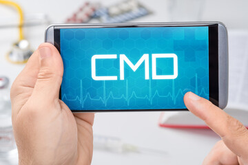 Smartphone mit dem Text CMD auf dem Display