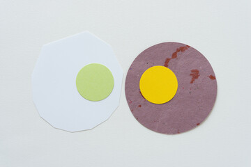 mostly paper circles on blank paper