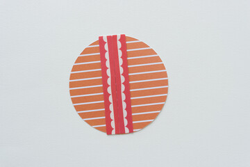 paper circle with stripes and fancy border
