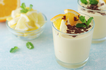 Orange lemon citrus milk mousse in glasses