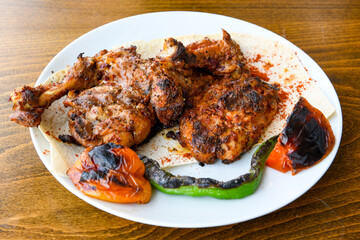 Chicken wings barbeque in a dish with BBQ grill sauce . Izgara tavuk kelebek sis kanat. Tavuk sis, gogus.