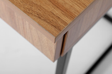 Details of wood and metal. Metal shelf