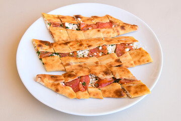 Kiymali pide. Turkish pide with minced meat. Turkish pizza mince pita Pide on white background. Etli ekmek. Kusbasi kasarli pide.