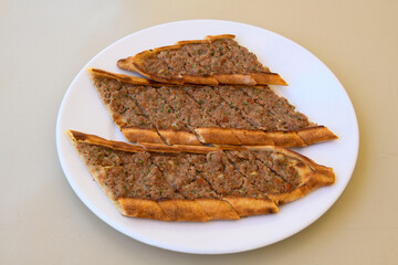 Kiymali pide. Turkish pide with minced meat. Turkish pizza mince pita Pide on white background. Etli ekmek. Kusbasi kasarli pide.