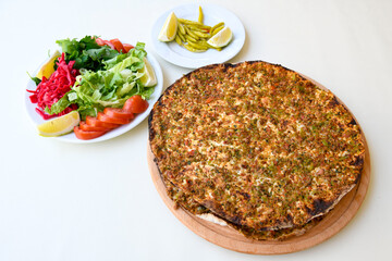 Kiymali pide. Turkish pide with minced meat. Turkish pizza mince pita Pide on white background. Etli ekmek. Kusbasi kasarli pide.