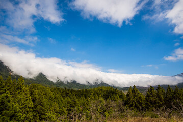 Fototapeta premium Clouds waterfall in Caldera De Taburiente Nature Park, La Palma Island, Canary Islands, Spain