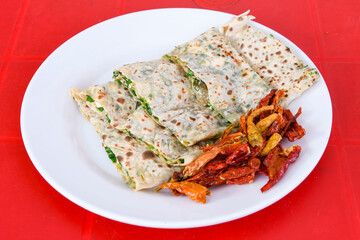 Homemade burek (borek)  with cheese and spinach and boiled egg.Traditional food. Peynirli, Patatesli, kiymali kol boregi.