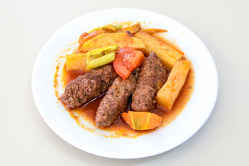 Eksili Kofte. Very nice izmir patties, potatoes, tomatoes and Turkish spices. Misket Izmir Kofte. Sulu Kofte. Fellah, ekmek arasi izgara kofte. Manisa, Akcaabat, Akhisar kofte. Delicious meat grilled 