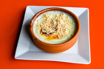 Baked rice pudding turkish milky dessert sutlac, keskul  (Turkish name; firin sutlac)