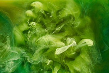 Liquid fluid art abstract background. Green dancing acrylic paints underwater, cosmic smoke ocean © amixstudio