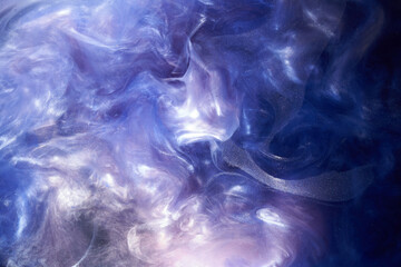 Liquid fluid art abstract background. Blue acrylic paint underwater, galactic smoke ocean