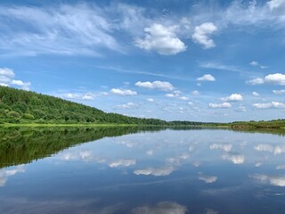 Beautiful landscape. River shore and blue sky summer