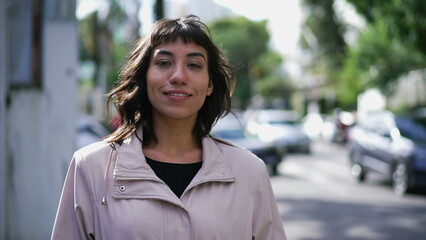 One Brazilian latina woman standing in urban street walking © Marco