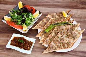 Turkish pita with minced cubed meat and cheese (Turkish name: Kiyma Kusbasi kasarli pide)
