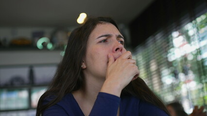 Woman with preoccupied emotion closeup face. Pensive thoughtful person thinking