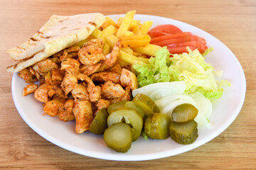 Chicken wings barbeque in a dish with BBQ grill sauce . Izgara tavuk kelebek sis kanat. Tavuk sis, gogus.