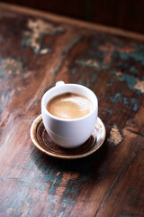 Cup of coffee on rustic wooden background. Close up. Copy space.                                                                                                                                        