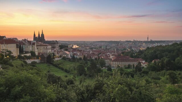 Prague Czechia Czech Republic time lapse 4K, high angle view city skyline night to day sunrise timelapse of old town and Prague Castle