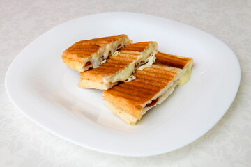 Turkish karisik atom  tost ( kasarli bazlama tost) . Flat baked bread toasted